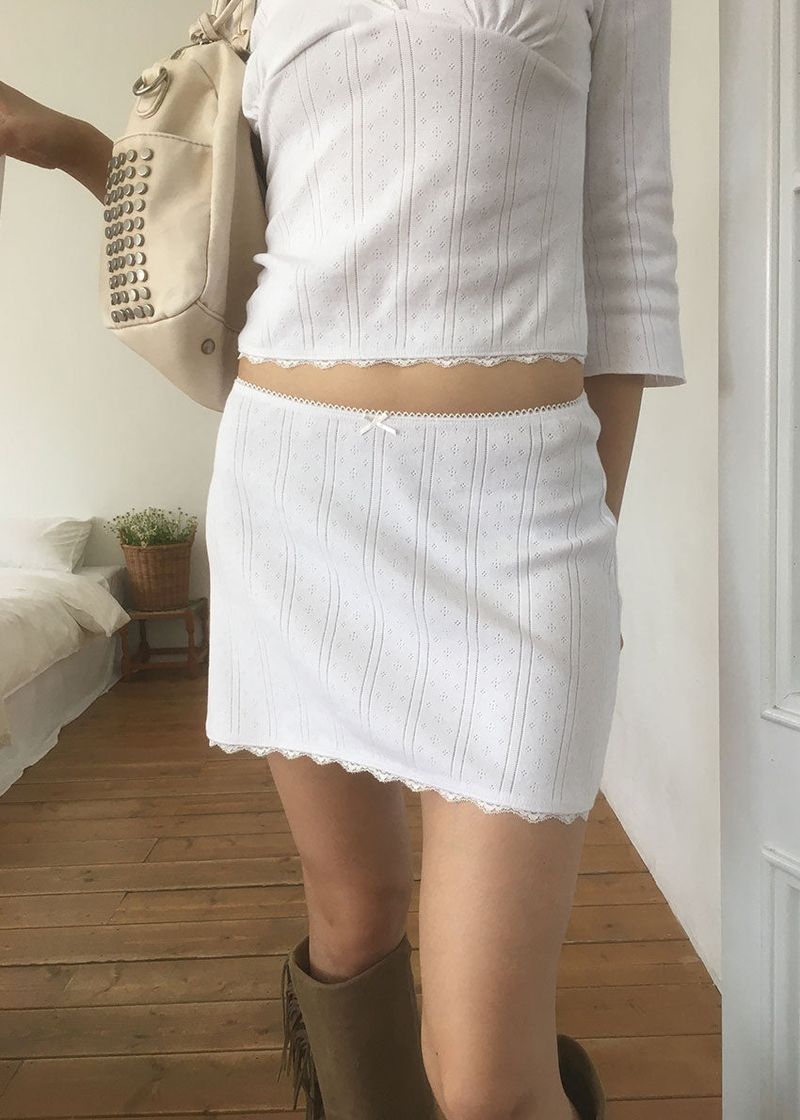 PINTER PUNCHING MINI SKIRT (2color)