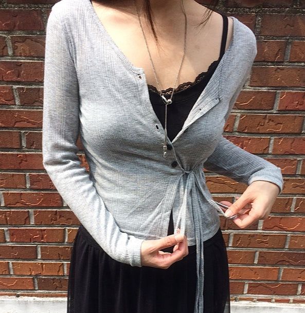 anyonemore（エニーワンモアー）の「Riiing Strap Button V Ribbed Cardigan（Tops）」