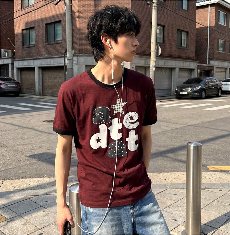 UNDEROFF（アンダーオフ）の「Essential Standard Short-Sleeve Ringer T-Shirt Alpha Appliqué Burgundy（Tops）」