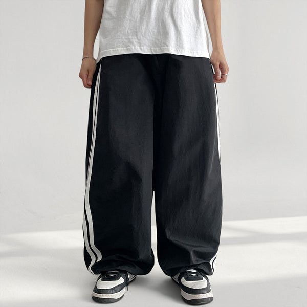 voarc（ボアク）の「Heath waistband track training hem string wide pants (2 colors)（Pants）」