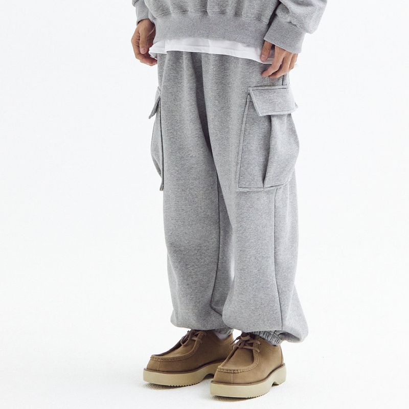 AKECII(アケシ)の「Balloon over cargo fleece jogger pants Melange Gray(Tops)」
