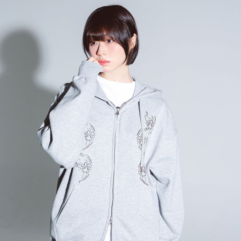 NEWKITSCH(ニューキッチジェネレーション)の「CAT FOOTPRINT GRAPHIC HOOD ZIP-UP (MELANGE)(Tops)」