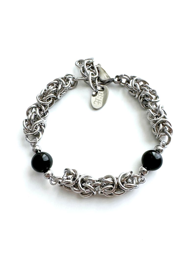 BUZZERBE（ブザービー）の「Black Onyx O-ring Connection Bracelet（Accessories）」