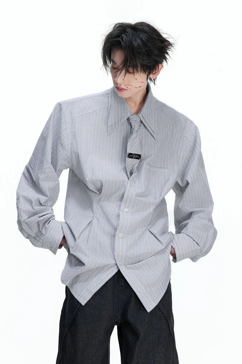 Argue Cultureの「Striped Shoulder Pad Tie Shirt(Tops)」