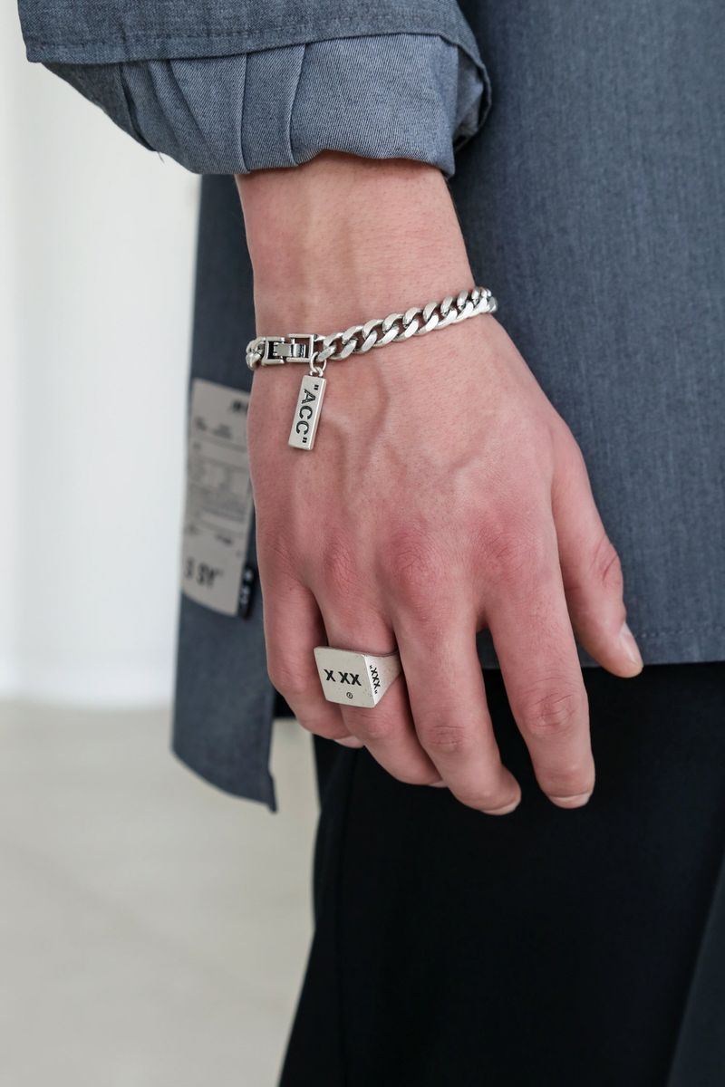 X XX LOGO RING (SURGICAL STEEL)