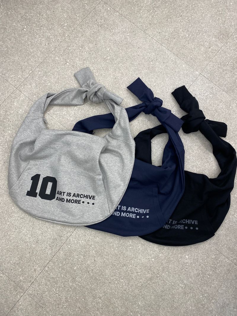 Ten More Crossbody Bag