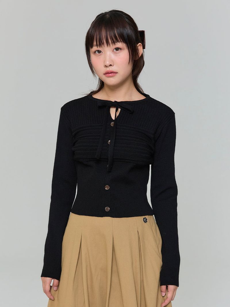 ADORE BELLE(アドールベル)の「RIBBON BUTTON SILM KNIT - BLACK(Tops)」