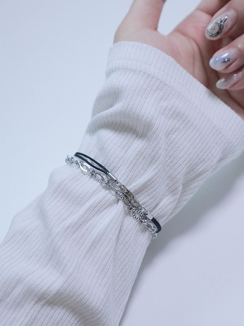 All surgical seel new wave layered string bracele