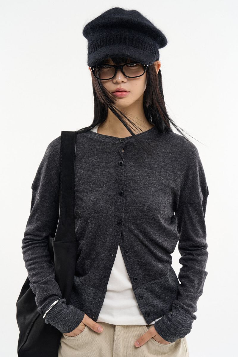 Raucohouse（ラウコハウス）の「Hiles wide rib round-neck cardigan（Tops）」
