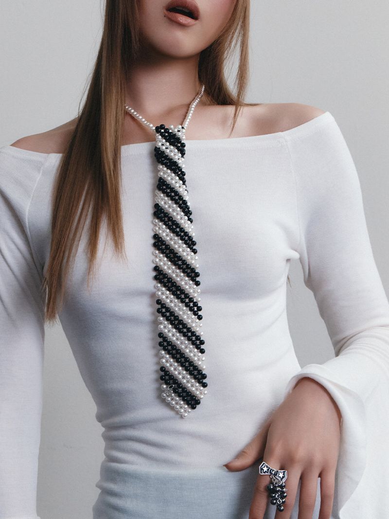 Eireve（エイレブ）の「BEADED TIE NECKLACE (STRIPE)（Accessories）」