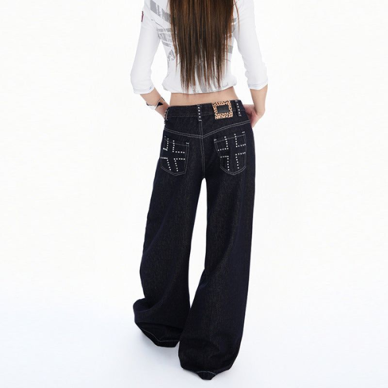 La mode MAQI（ラ モード マキ）の「Dark Blue Washed Studded Wide-Leg Jeans（Pants）」