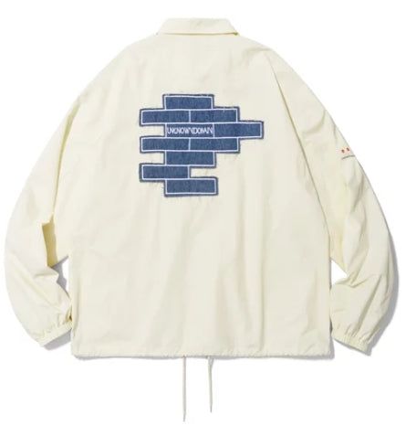 UNKNOWNDOMAIN（アンノーンドメイン）の「U.N EAST AND THE WEST J110 _ BEIGE（Jackets/Outerwear）」