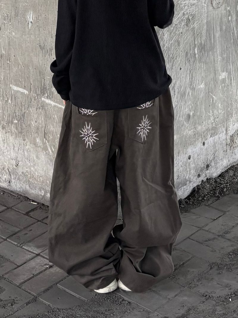 spica raw-edge embroidery pants