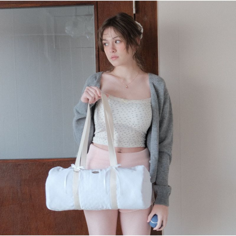 cozing(コジング)の「Glow duffle bag_white(Bags)」