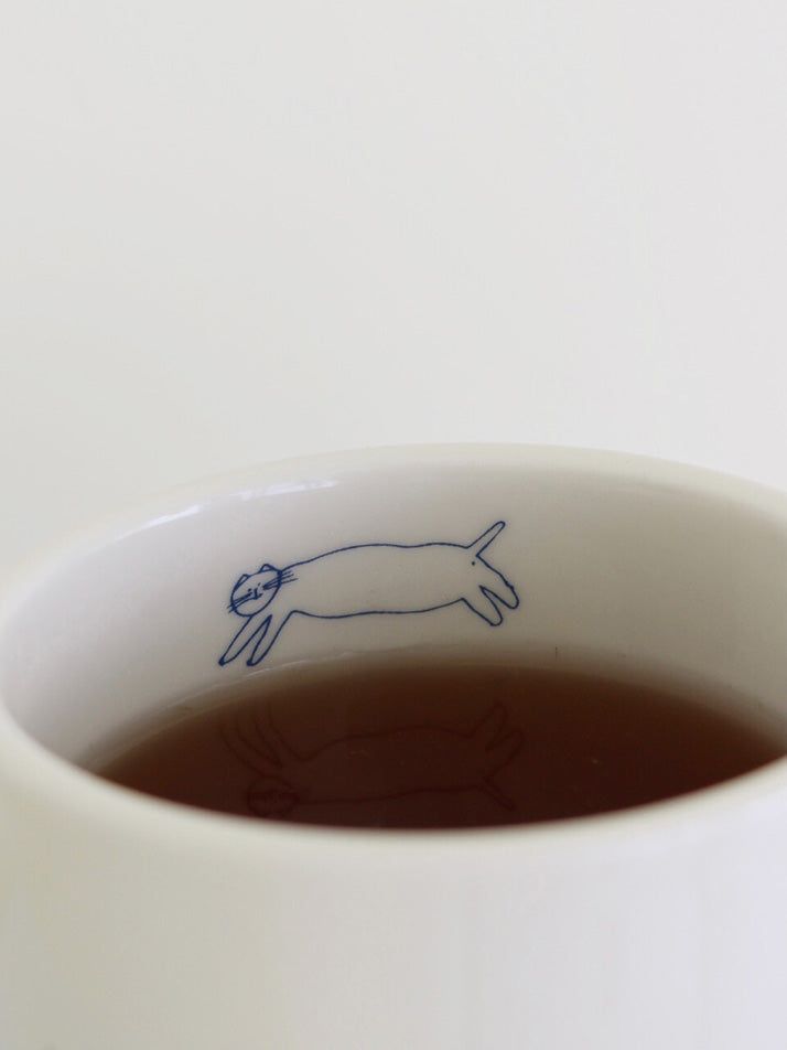 Hiding Cat Mug
