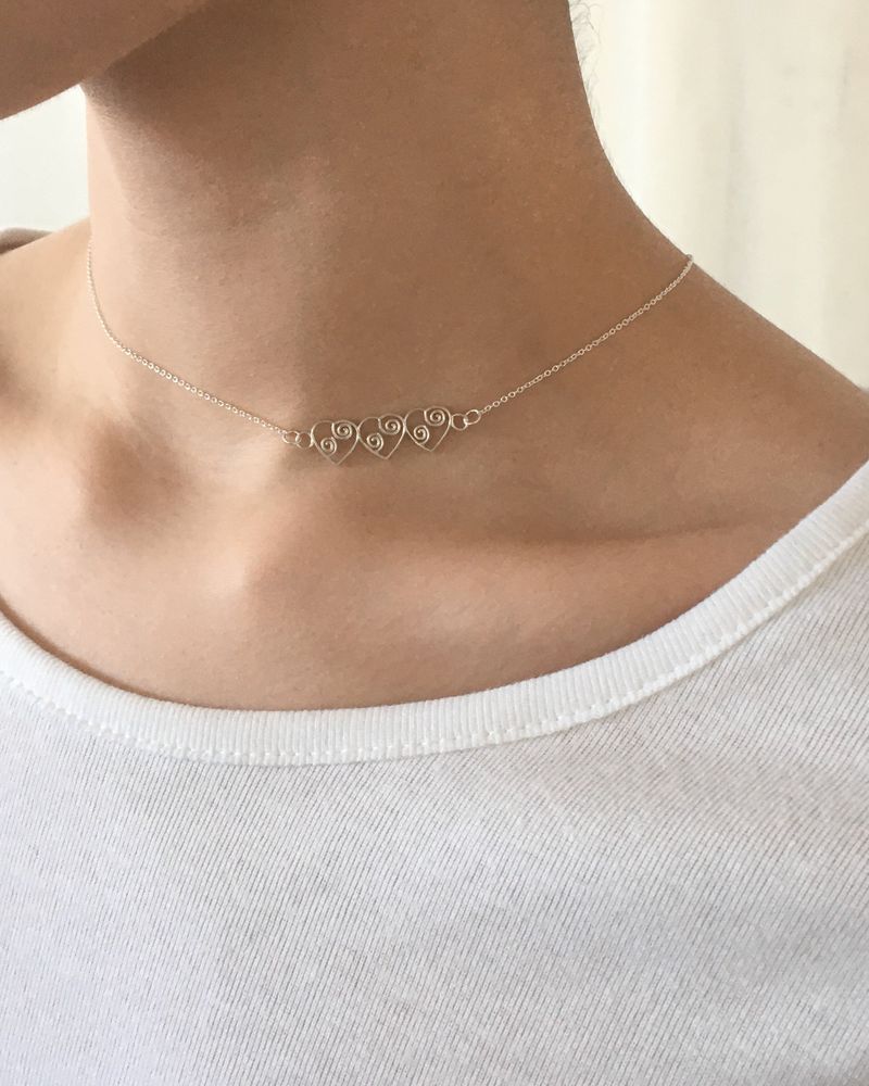 PAIR OF LOVE（ペアオブラブ）の「[925SILVER] リズム トリプルハートネックレス（アクセサリー）」