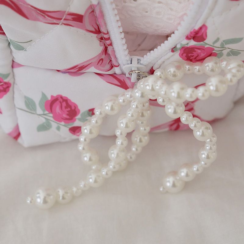 OVT-U(オーブイティーユー)の「Rose-pattern pouch (2color)(Smartphone Accessories)」