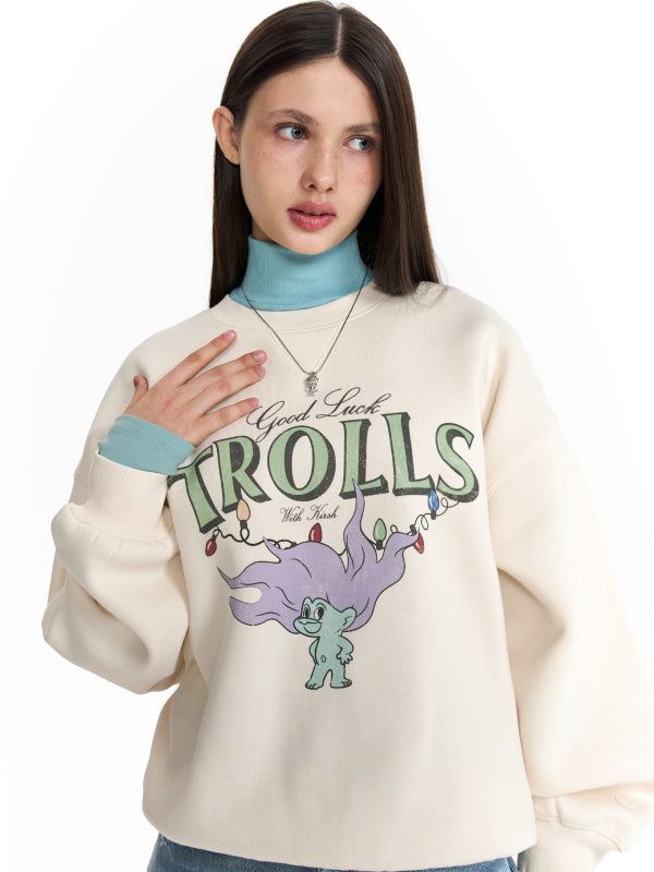 KIRSH（キルシー）の「TROLLS VINTAGE GRAPHIC NAPPING SWEATSHIRT - IVORY（Tops）」