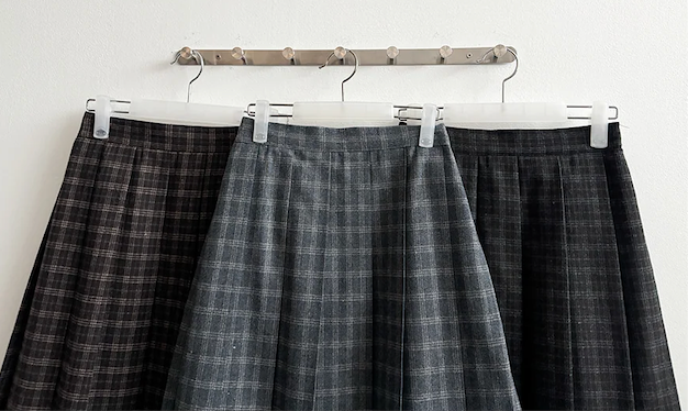 Bomi A-line pleated check midi skirt 