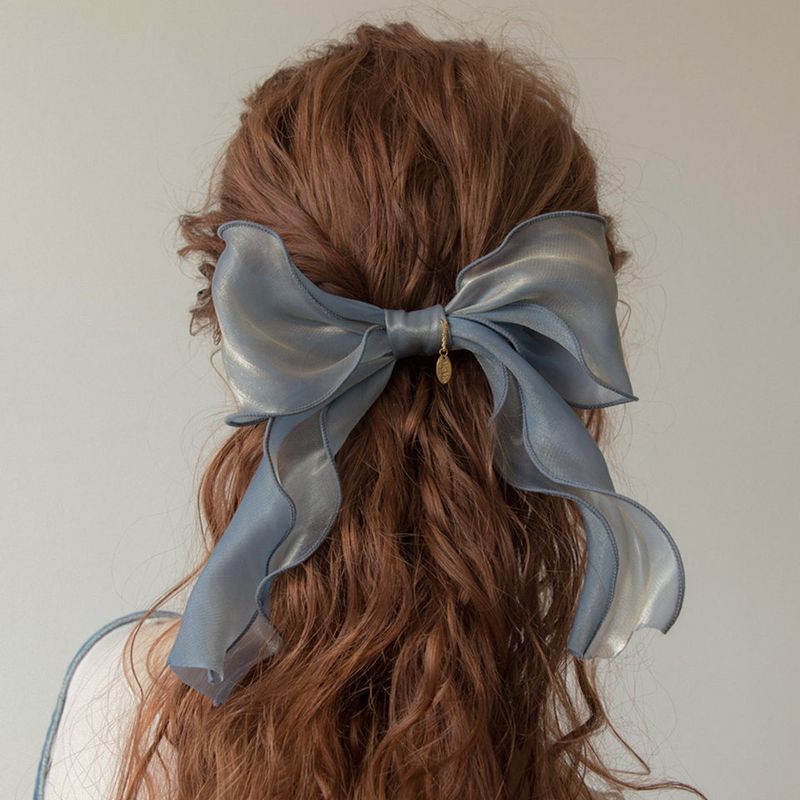 MerryMotive（メリーモチーブ）の「ブルーオーガンザラッフルリボンヘアピン（ヘアアクセサリー）」