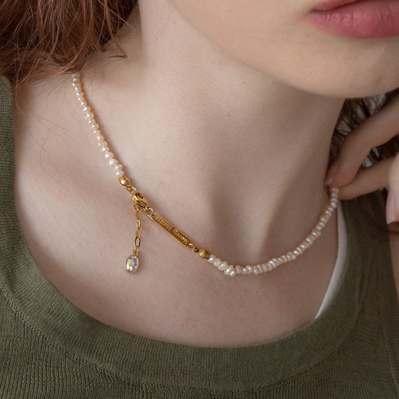 MerryMotive(メリーモチーブ)の「Tiny pearl with drop pendant necklace(Accessories)」