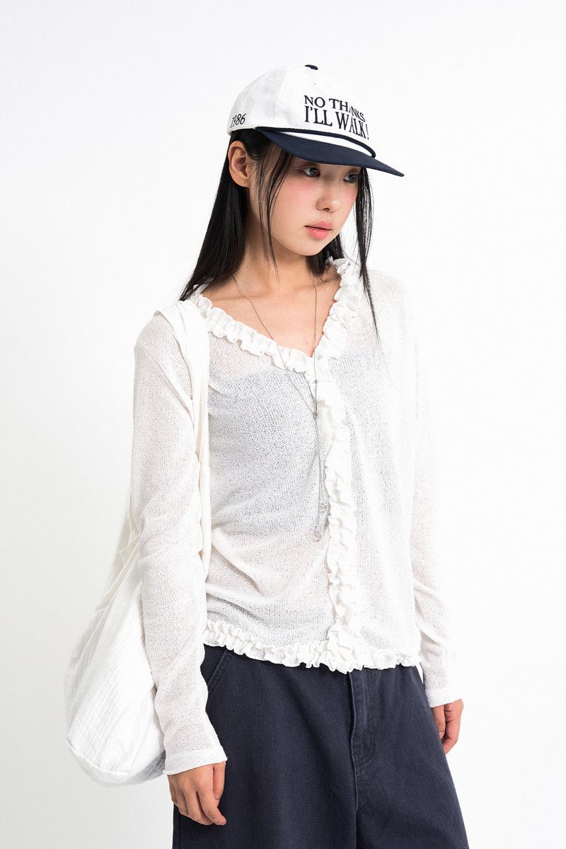 Raucohouse（ラウコハウス）の「Peaky Ruffle V-neck Cardigan（Tops）」