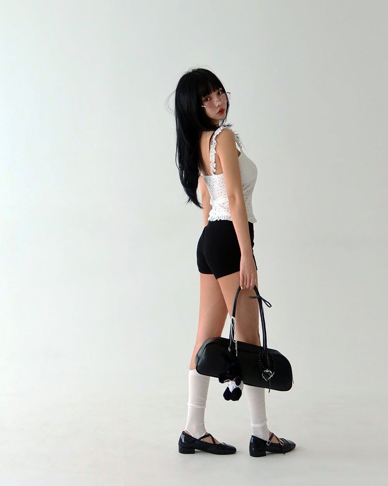 a punching eyelet bustier blouse