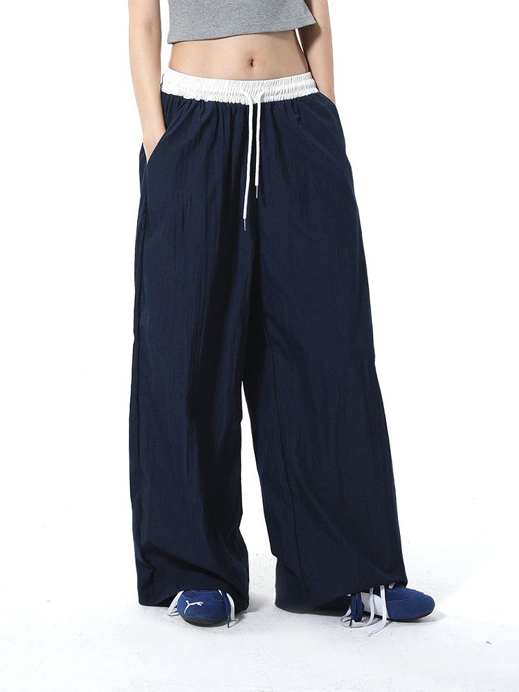summon oak（サモンオーク）の「Summon Oak American-style spliced contrast-color casual pants for women, loose straight-cut wide-leg sports trousers with a good draping effect（Pants）」