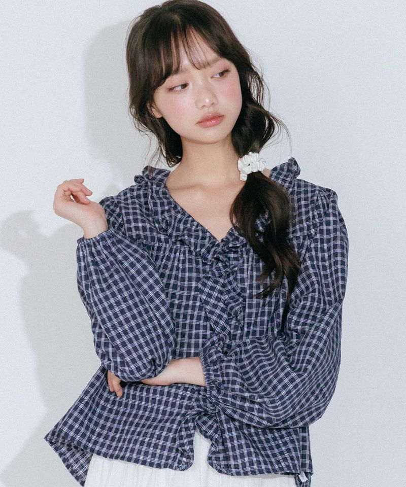mellotory（メロートリー）の「FRILL NECK CHECK BLOUSE (NAVY)（Tops）」