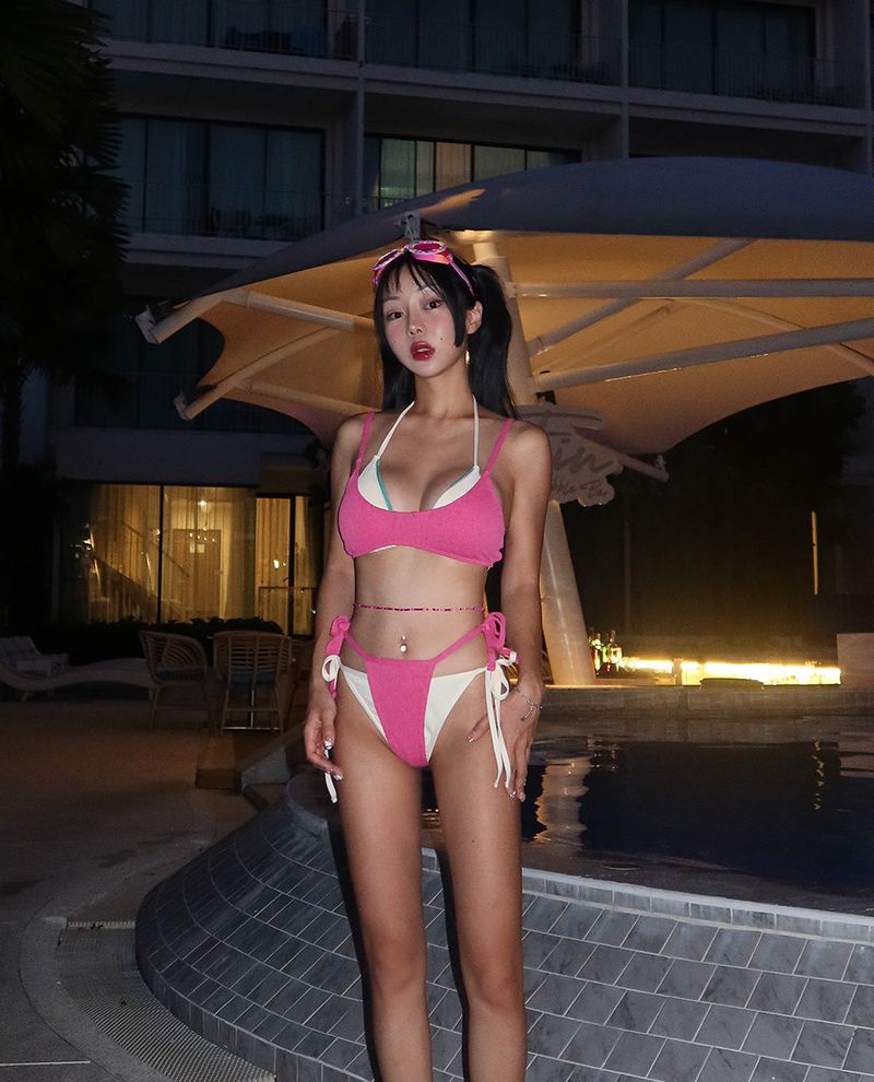 a set of 2 layered colored bikinis