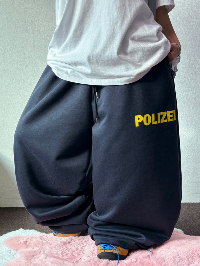 CCORTTI（コルッティ）の「HIGH QUALITY ✨フロントボールドレタリングタトゥーセミワイドバルーンパンツ 💙💛💚 - 4 COLORS（パンツ）」