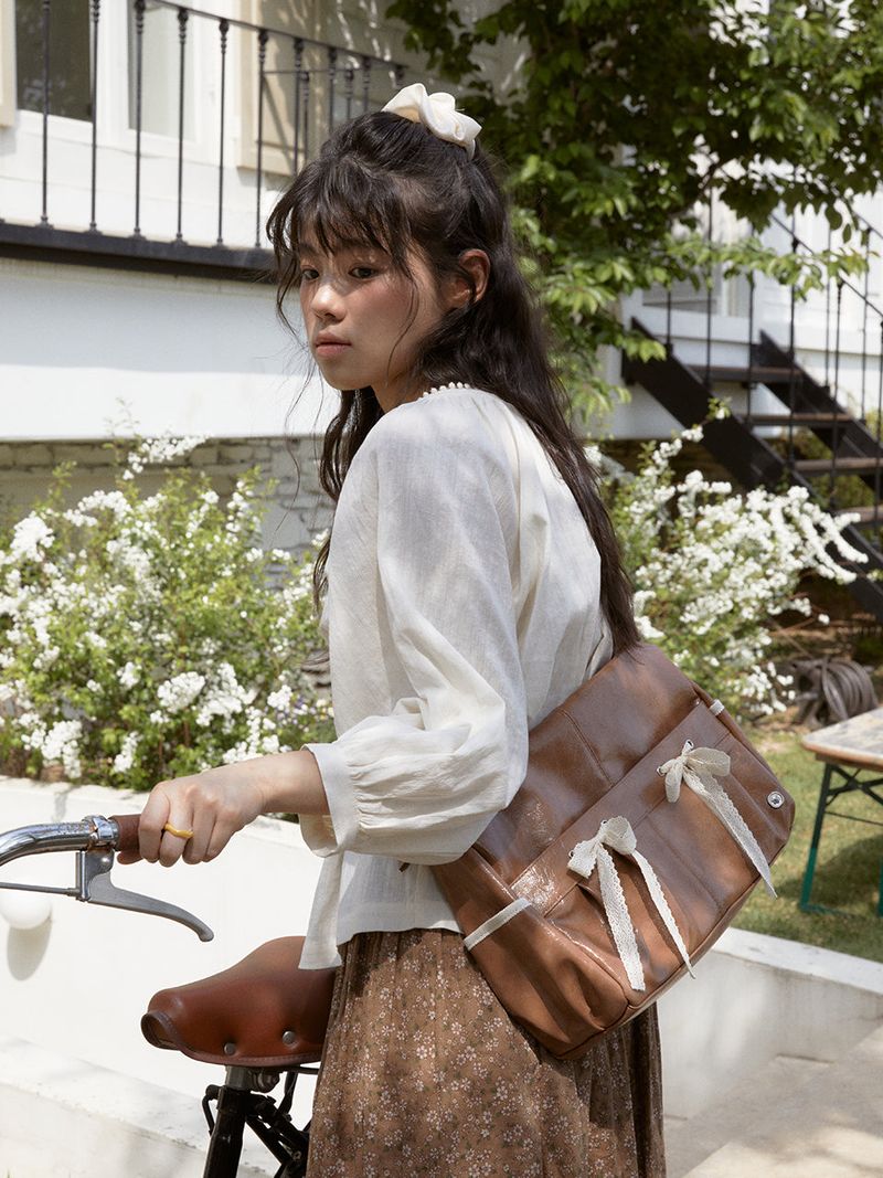 ovuni（オーブニ）の「Ribbon duffel bag_caramel brown（Bags）」