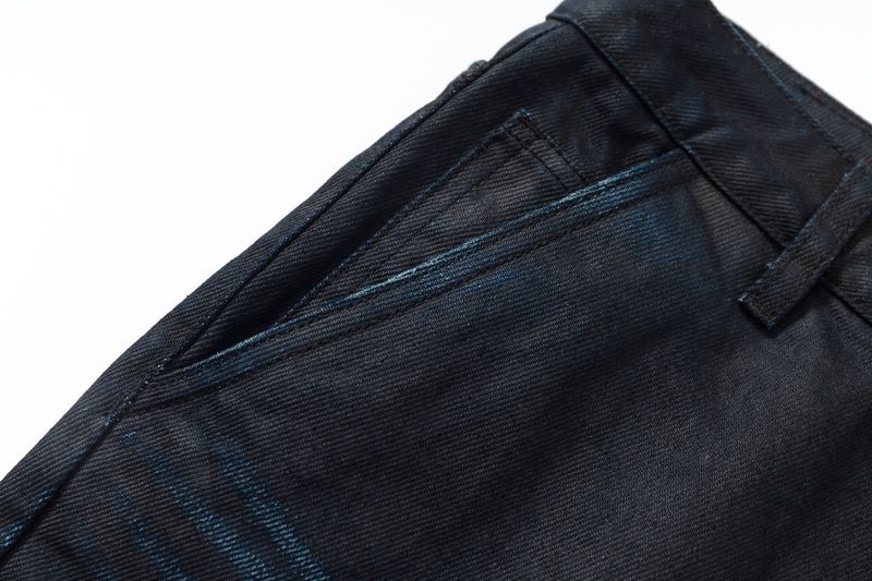 COATED KNIFE-SCRAPED HAND-WIPED DISTRESSED BOOTCUT JEANS