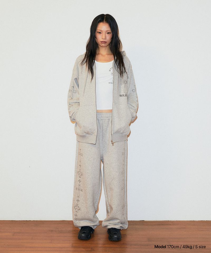 mahagrid(マハグリッド)の「CROSS STUD SWEATPANT(Pants)」
