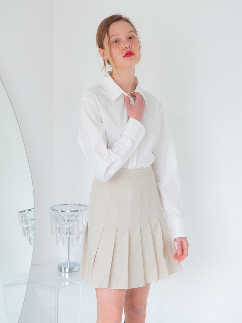 vem.ver（ベムバー）の「PLEATS SKIRT_BEIGE（Skirts）」