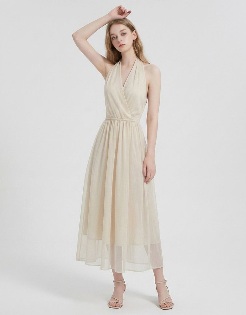 TWEEDY-A（ツウィーディア）の「ロリエルホルターネックシアーラップロングドレス Ivory（セットアップ）」