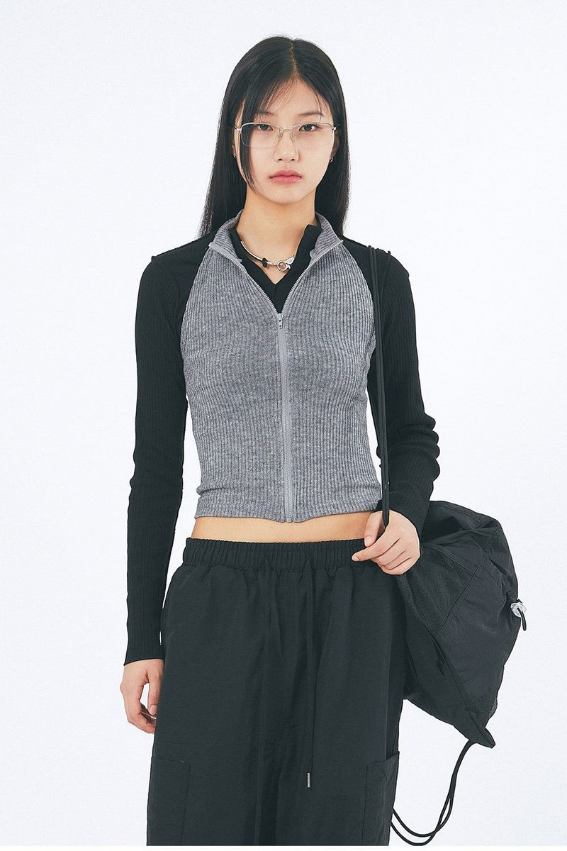 Raucohouse（ラウコハウス）の「High halter-neck crop zip-up sleeveless（Tops）」