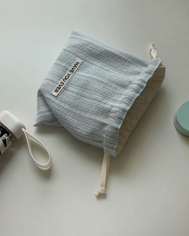 Pattern string pouch - blue stripe , S size