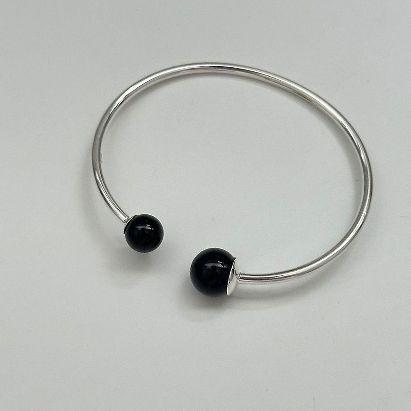 MOSXE（モスクス）の「[925silver] ツーボールオニキスバングル（アクセサリー）」