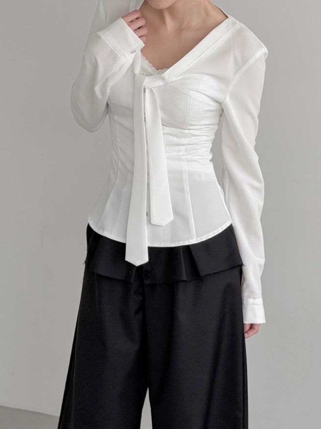 mnem（ムネム）の「Eve Tie Snap Blouse（Tops）」
