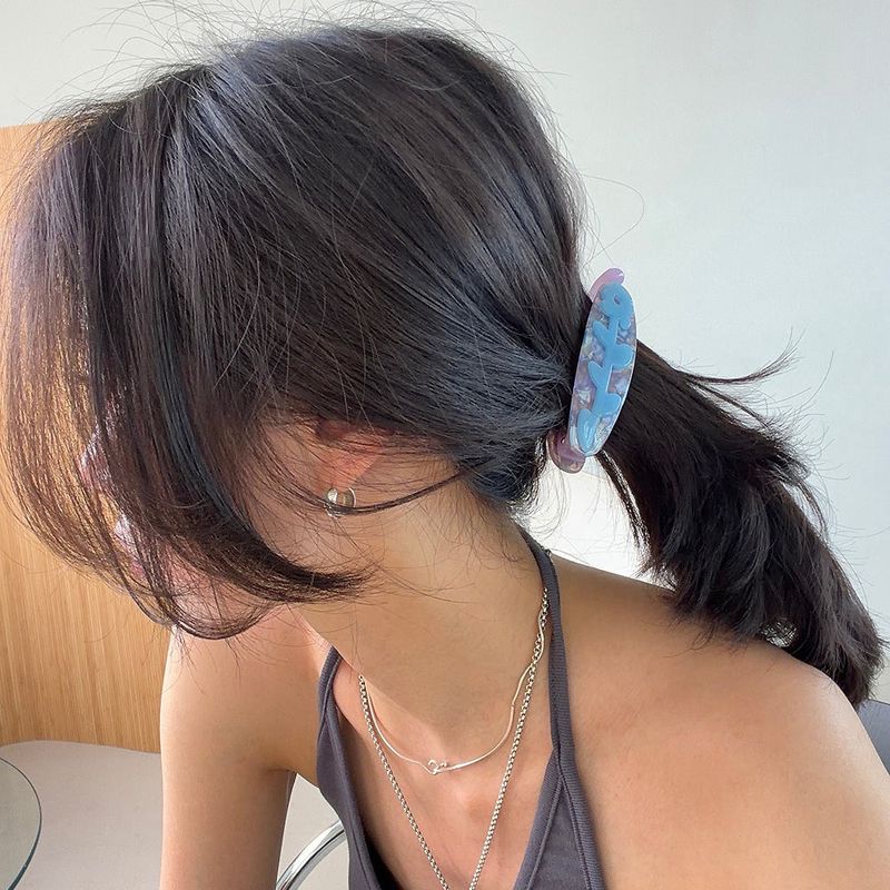 MOSXE（モスクス）の「フラワー モチーフ バナナ ヘアクリップ(6color)（ヘアアクセサリー）」