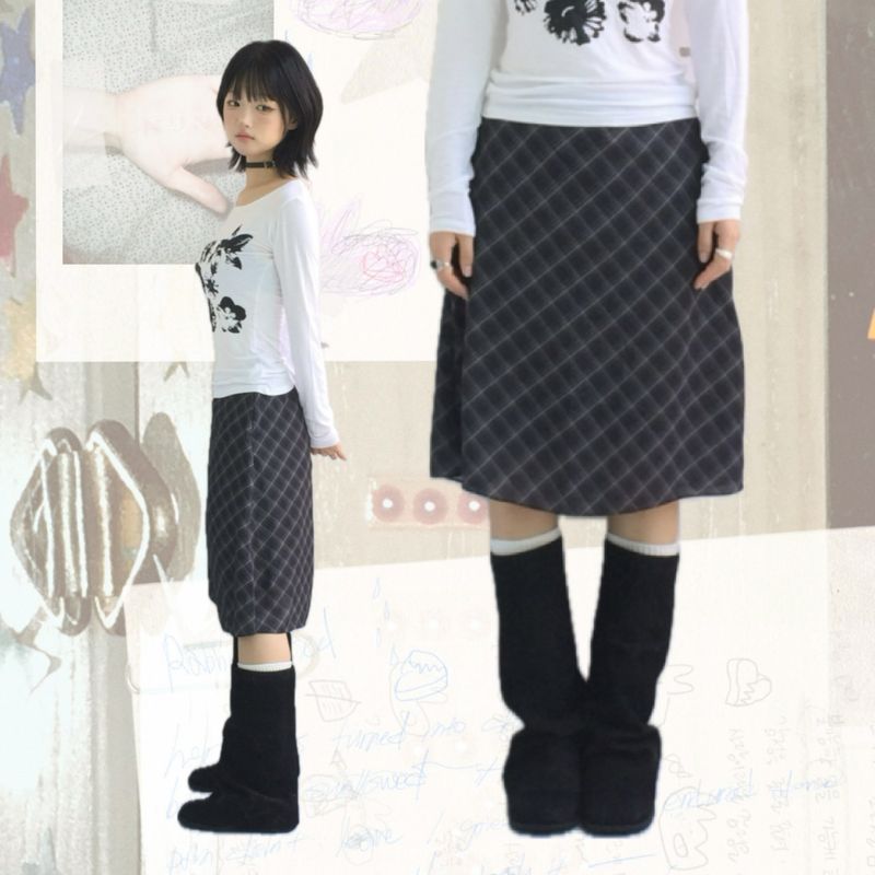 ner.ui.bin(ノエビン)の「More cross checkered skirt(Skirts)」