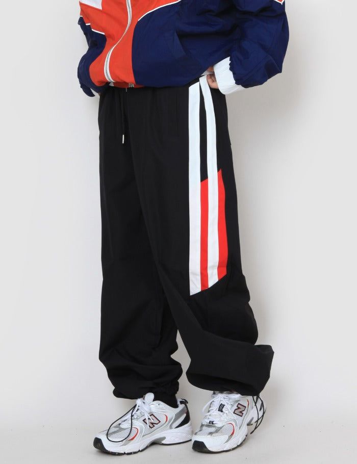 nutellike(ヌテールライク)の「line colored track pants(Pants)」