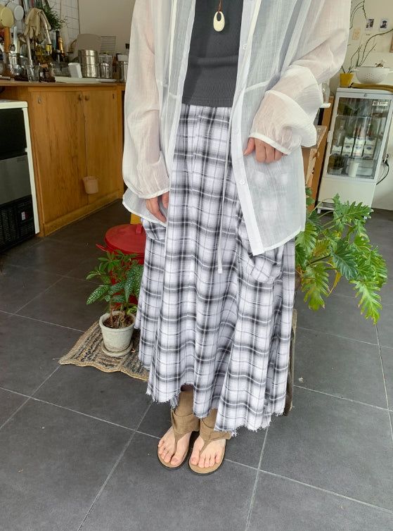 BAON（バオン）の「26SS★ [BAONHAUS] Chemini Check Unbalance Long Skirt（Skirts）」