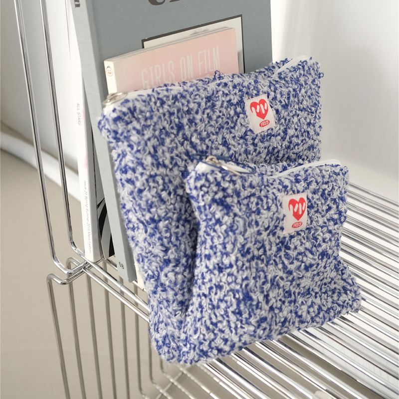 minmin(ミンミン)の「BBogle Pouch Blue Curl - Large(Smartphone Accessories)」