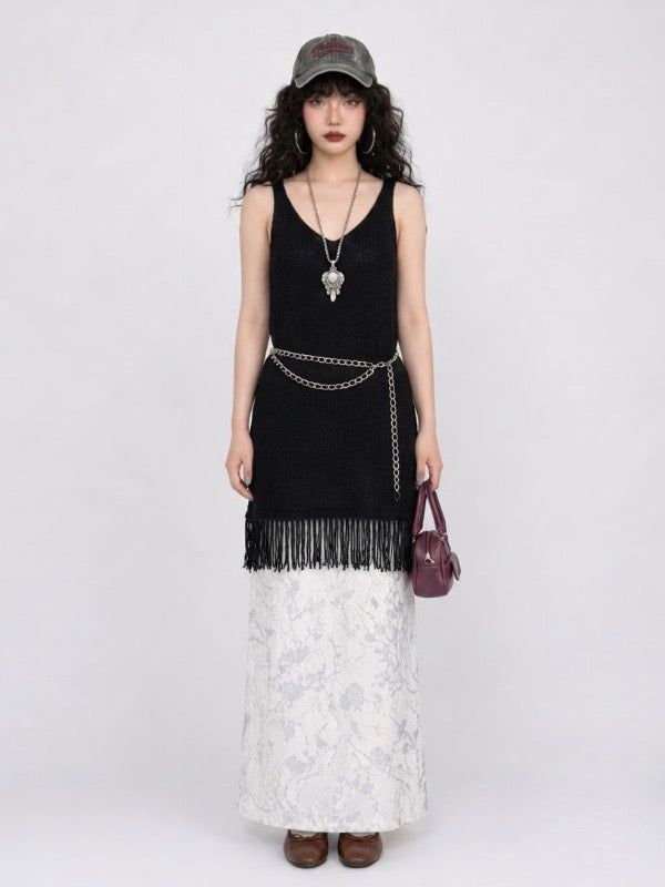 VIVIC（ビビク）の「FRINGE-HEM KNIT V-NECK DRESS IN BLACK（Dresses）」