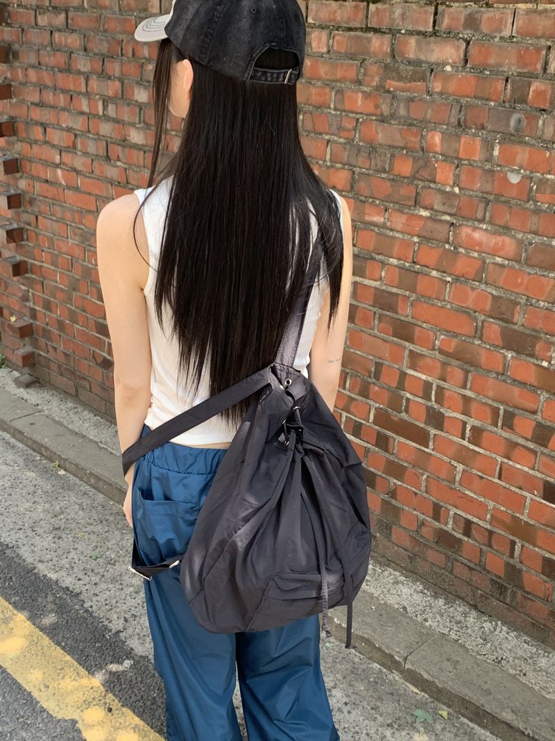 WONDER WONDER（ワンダーワンダー）の「Pleated Daily Nylon String Pocket Backpack（Bags）」