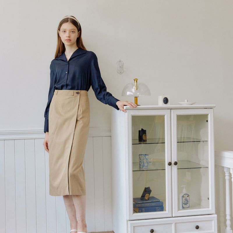 yuppe(ヤッピー)の「コットンラップスカート / COTTON WRAP SKIRT_BEIGE(Skirts)」