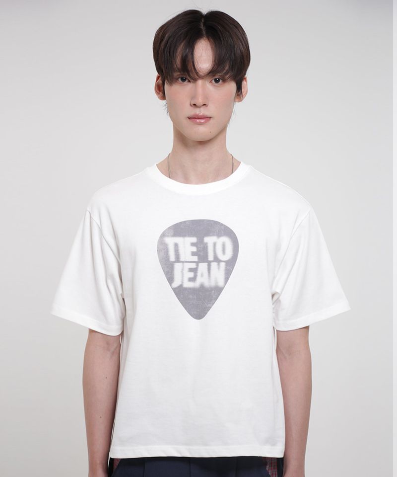 TIE TO JEAN（タイトゥジーン）の「ピックグラフィック レギュラーフィット セミクロップドTシャツ オフホワイト（トップス）」