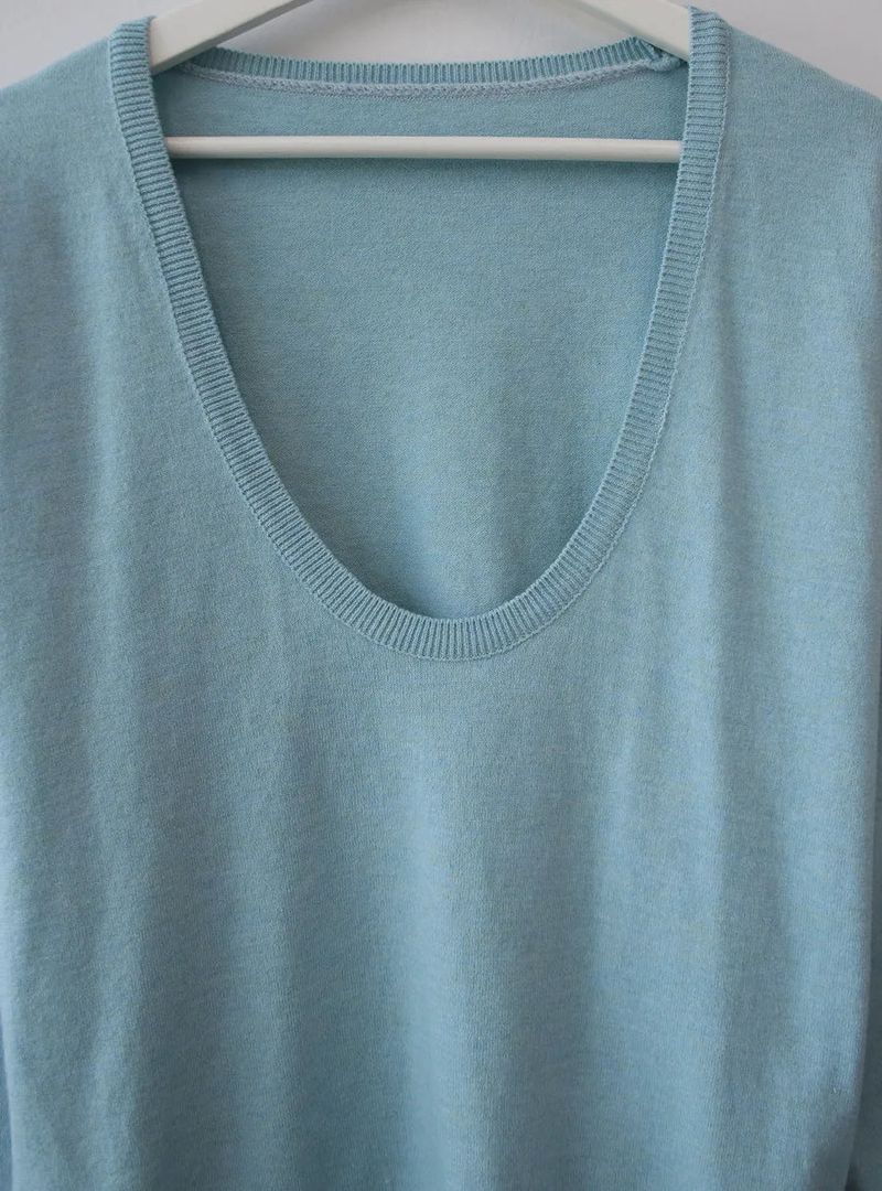deep U-neck knit top